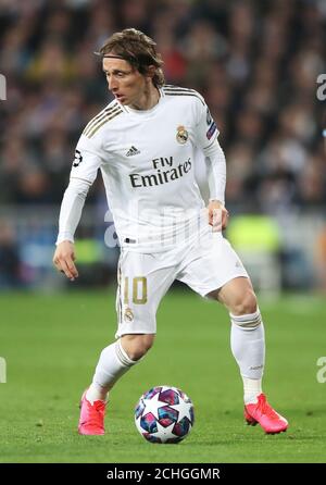 Real Madrid's Luka Modric during the UEFA Champions League round of 16 first leg match at the Santiago Bernabeu, Madrid. Stock Photo