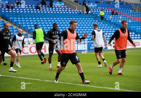 Charlton Athletic's Jason Pearce (left) and Tom Lockyer (right) warm up before the Sky Bet Championship match at the Cardiff City Stadium. PA Photo. Issue date: Tuesday June 30, 2020. See PA story SOCCER Cardiff. Photo credit should read: Adam Davy/PA Wire. RESTRICTIONS: No use with unauthorised audio, video, data, fixture lists, club/league logos or 'live' services. Online in-match use limited to 120 images, no video emulation. No use in betting, games or single club/league/player publications. Stock Photo