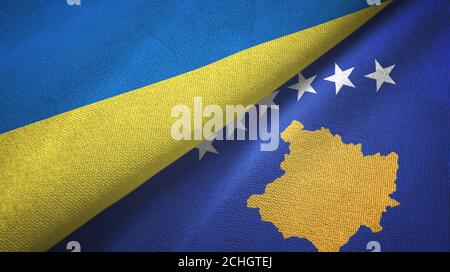 Ukraine and Kosovo two flags textile cloth, fabric texture Stock Photo