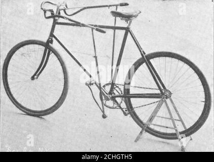 . Scientific American Volume 84 Number 05 (February 1901) . on the handle bar beinghere applied directly in helping to rotate the pedals.The machine is steered by the thumbs, which oper-ate the two small loops onthe handles of the levers.These loops are connectedto the steering headthrough a short handlebar, and move the frontfork without moving thecross bar to which thelevers are attached. In operating this ma-chine the rider exerciseshis arms as well as hisfeet; he is obliged to siterect, and to bring all themuscles of the body intoplay as the latter swaysslightly from side to side.So comple Stock Photo