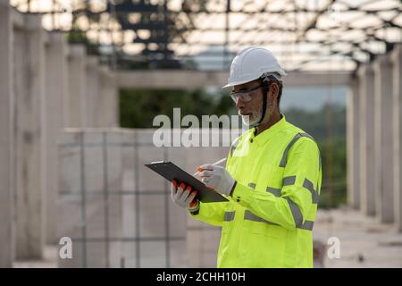 Engineering working in the construction site Stock Photo