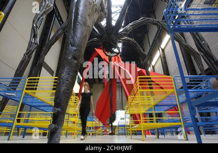 A visitor walks through the 'TH.2058' installation, by French artist Dominique Gonzalez-Foerster, the latest in the Unilever Series at the Tate Modern Gallery, Southwark in London. Stock Photo