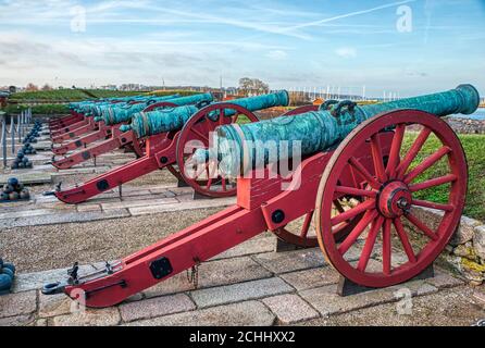 Medieval cannons at Kronborg Slot (Castle) for Danish trades protection in the Oresund Strait convey warfare, defence and fighting concept. Elsinore Stock Photo