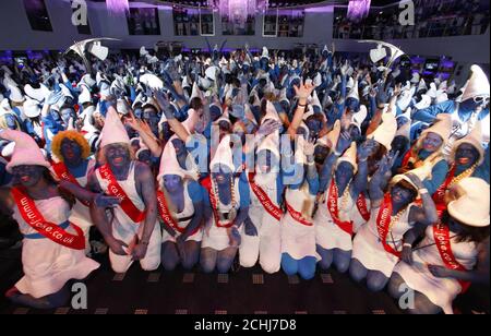 The scene in the Oceana nightclub in Swansea where 2,510 people, the majority of whom were students from the local university, gathered to smash the world record for the largest number of people dressed as Smurfs. Stock Photo