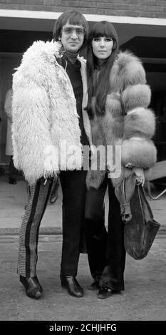 American pop singers Sonny and Cher at Heathrow Airport, London. The couple have flown in from Paris and are to appear on television in Top of the Pops and the Eamonn Andrews Show. Stock Photo