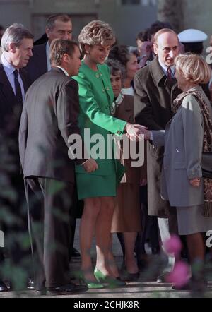 The Princess of Wales is greeted on her arrival to a centre for handicapped children in Paris on the first day of her three-day visit to France. Stock Photo