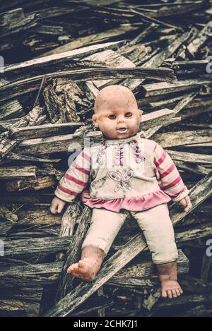 Creepy old doll looks like a little baby Stock Photo Alamy