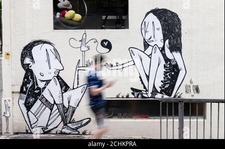 Hong Kong,China:SEPTEMBER 11th, 2020.  Brazilian,Alex Senna, known for his monochrome street artworks, joined the HKWalls 2018 team. His work by the C Stock Photo