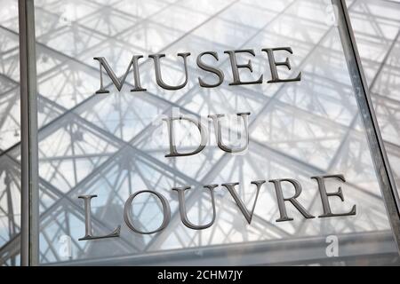 Sign of Louvre Museum in Paris Stock Photo