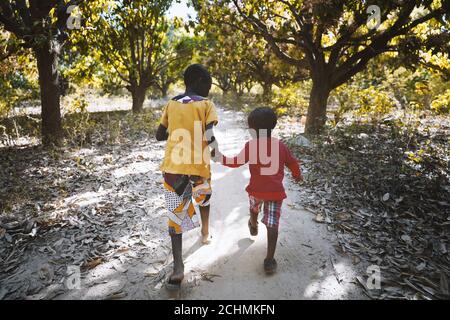 Handsome African Black Boys Having Fun in Little Village Outside Bamako, Mali Stock Photo