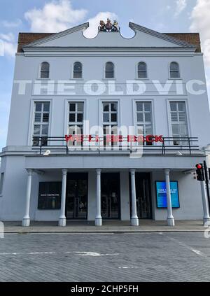 The Old Vic theatre in London, closed since 16th March 2020 as a result of the COVID-19 pandemic. A neon sign proclaims ‘We’ll be back’ Stock Photo