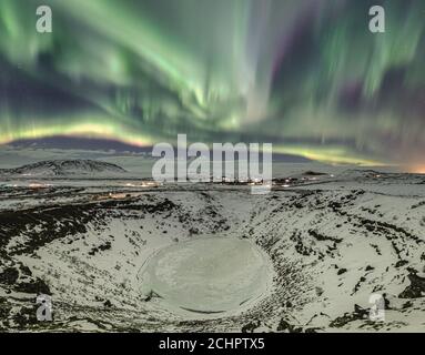 Northern Lights over extinct volcano in Iceland Stock Photo