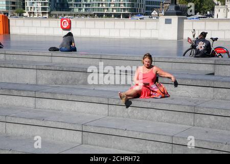 London, UK 14 Sept 2020 - Fewer people enjoy the warm and sunny weather in More London during lunchtime as the mini heatwave continues in the capital. More London and nearby Potters Field Park would normally be very busy with tourists and office workers during sunny weather. The government has announced that gatherings of more than six people are banned from today as the numbers of COVID19 cases have started to increase. Credit Dinendra Haria /Alamy Live News Stock Photo