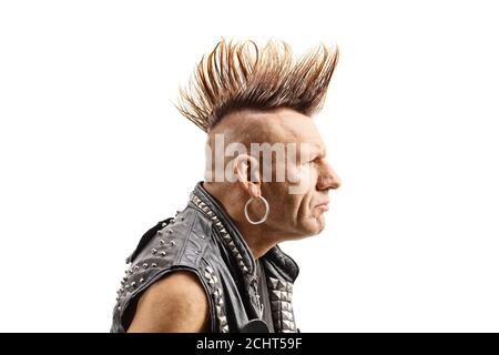 Profile shot of a middle aged punker with a mohawk isolated on white background Stock Photo