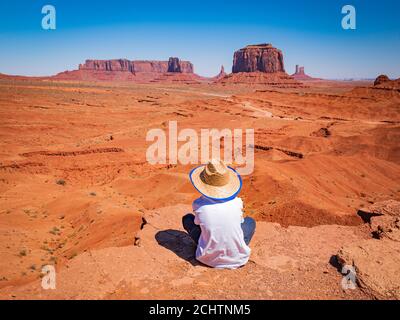 Child admires panorama from John Ford Point in Monument Valley