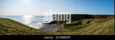 Panoramic Nash Point cliff side view overlooking ocean Stock Photo