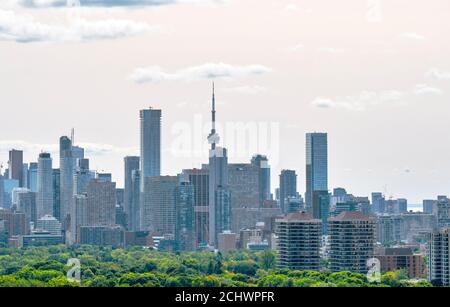 Strange pink orange colors covers southwest sky over Toronto on a normally sunny day, due to high atmospheric smog pollutants from the wildfires in American West Coast States of Washington, Oregon and California Stock Photo