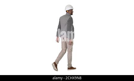 Arabian engineer with hardhat walking Safety concept on white background. Stock Photo