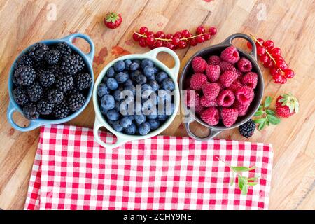 three bowls of fresh beriies Stock Photo