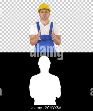 Foreman builder explaining something to camera and talking, Alph Stock Photo