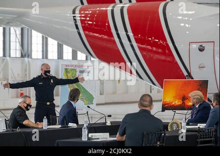 Sacramento, CA, USA. 14th Sep, 2020. Cal Fire Director Thom Porter explain the wildfires that have been burning to President Donald Trump and California Gov. Gavin Newson at Sacramento McClellan Airport on Monday, Sep 14, 2020 in Sacramento. Credit: Paul Kitagaki Jr./ZUMA Wire/Alamy Live News Stock Photo