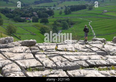 Limestone pavements above Malham Cove in the Yorkshire Dales National Park. Stock Photo