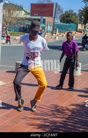 Traditional Pantsula dancing in Soweto township, Johannesburg, South Africa Stock Photo