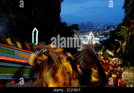 Hindu devotees climb the steps to Batu Caves during Thaipusam in Kuala Lumpur, Malaysia January 21, 2019. REUTERS/Lai Seng Sin
