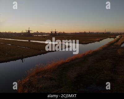 beautiful panorama of Zaanse Scans in the Netherlands. Windmills on ponds and streams Stock Photo