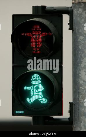 An image of German philosopher Karl Marx is seen in a traffic light for passengers in his hometown in Trier, Germany, April 13, 2018.   REUTERS/Wolfgang Rattay