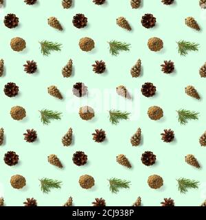 christmas seamless patterns with Pine cones wine cork and lingonberry. pattern christmas seamless on a green backdrop. Realistic photo collage. Stock Photo