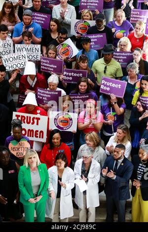 Pro-choice supporters, lawmakers, and health professionals are seen at a press conference featuring Democratic 2020 U.S. presidential candidate and Senator Kirsten Gillibrand (D-NY) following a roundtable discussion with abortion providers, health experts, pro-choice activists, and state legislators at the Georgia State House in Atlanta, Georgia, U.S., May 16, 2019.  REUTERS/Elijah Nouvelage