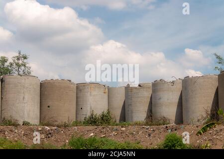 concrete pipe wall on a sunny day. fence concept Stock Photo