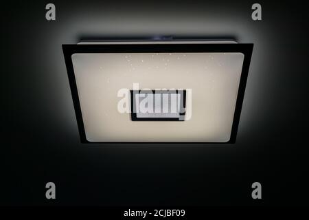 Modern luxuary square ceiling lamp with lights on Stock Photo