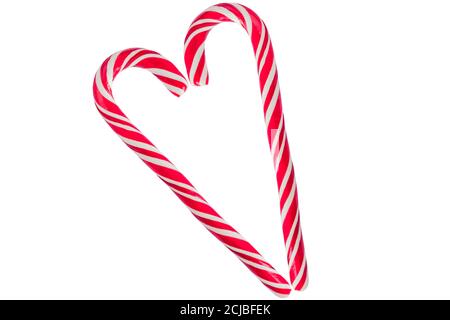 heart made of candy canes isolated on white background Stock Photo