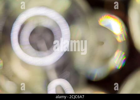 Abstract bokeh lights, bluring circles on dark background Stock Photo