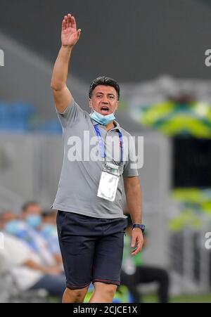 Doha, Capital of Qatar. 14th Sep, 2020. Shahr Khodrou's head coach Stephane Henri reacts during the AFC Asian Champions League group B football match between Shabab Al Ahli of United Arab Emirates and Shahr Khodrou of Iran at Al Janoub Stadium in Doha, Capital of Qatar, Sept. 14, 2020. Shabab Al Ahli won 1-0. Credit: Nikku/Xinhua/Alamy Live News Stock Photo