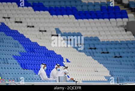 Doha, Capital of Qatar. 14th Sep, 2020. Local organizing officers watch the AFC Asian Champions League group B football match between Shabab Al Ahli of United Arab Emirates and Shahr Khodrou of Iran at Al Janoub Stadium in Doha, Capital of Qatar, Sept. 14, 2020. Shabab Al Ahli won 1-0. Credit: Nikku/Xinhua/Alamy Live News Stock Photo