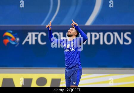 Doha, Capital of Qatar. 14th Sep, 2020. Hattan Bahebri of AL Hilal celebrates during the AFC Asian Champions League group B football match between AL Hilal of Saudi Arabia and Pakhtakor of Uzbekistan at Al Janoub Stadium in Doha, Capital of Qatar, Sept. 14, 2020. AL Hilal won 2-1. Credit: Nikku/Xinhua/Alamy Live News Stock Photo