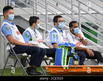 Doha, Capital of Qatar. 14th Sep, 2020. Members of the medical team are seen during the AFC Asian Champions League group B football match between Shabab Al Ahli of United Arab Emirates and Shahr Khodrou of Iran at Al Janoub Stadium in Doha, Capital of Qatar, Sept. 14, 2020. Shabab Al Ahli won 1-0. Credit: Nikku/Xinhua/Alamy Live News Stock Photo