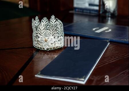 Notepad with an empty cover on the table. Empty menu template on the table in a cafe Stock Photo