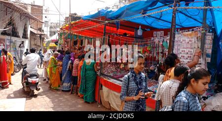 DISTRICT KATNI, INDIA - SEPTEMBER 24, 2019: Asian people crowd at local street traditional market in indian street market. Stock Photo