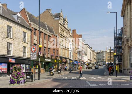 Shops and retail units in The Drapery, a shopping area within the town centre, Northampton, UK Stock Photo