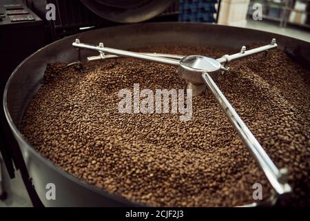 Cooling tray with freshly roasted coffee beans Stock Photo