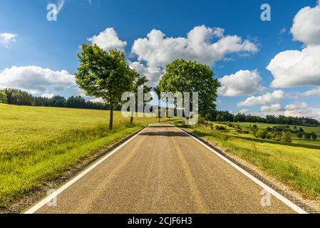 Country road in Hegau landscape, Watterdingen, Baden-Wuerttemberg, Germany Stock Photo