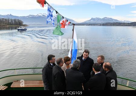 Markus Soeder, Prime Minister of Bavaria, meets with leaders of different alpine regions on a boat on lake Chiemsee near Prien am Chiemsee, Germany April 4, 2019. REUTERS/Andreas Gebert