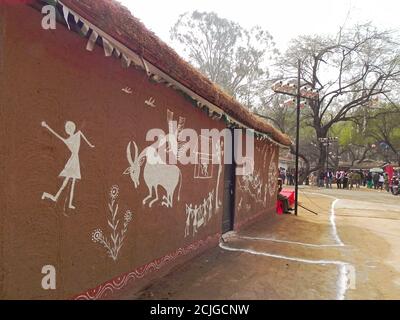 Tribal Painting on hut - Surajkund Craft Fair in Faridabad, Haryana, India Stock Photo