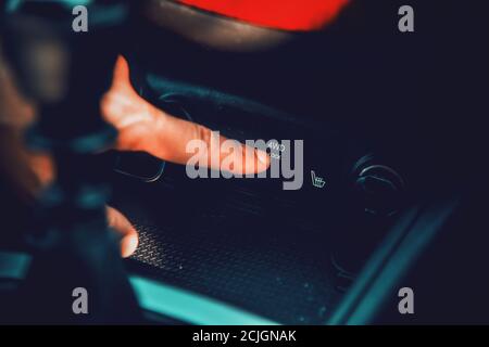 Close up of a man activating 4WD lock on a modern SUV Stock Photo