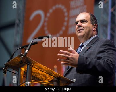 Easyjet founder Stelios Haji-Ioannou speaks at a media event to celebrate 20 years in business at Luton Airport, southern England, November 10, 2015. British low cost carrier easyJet said it would launch a loyalty scheme for its most frequent travelers, the latest perk to be added that is more usually associated with traditional airlines. At an event marking 20 years since its first flight on Tuesday, easyJet said it would reward customers who fly with it more than 20 times a year by offering them benefits such as flight changes for free.    REUTERS/Eddie Keogh