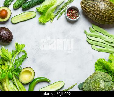 Food Frame. Fresh Green Vegetables on a Gray Background. Copy spice Stock Photo